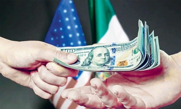 Dólares cambiando de mano a mano