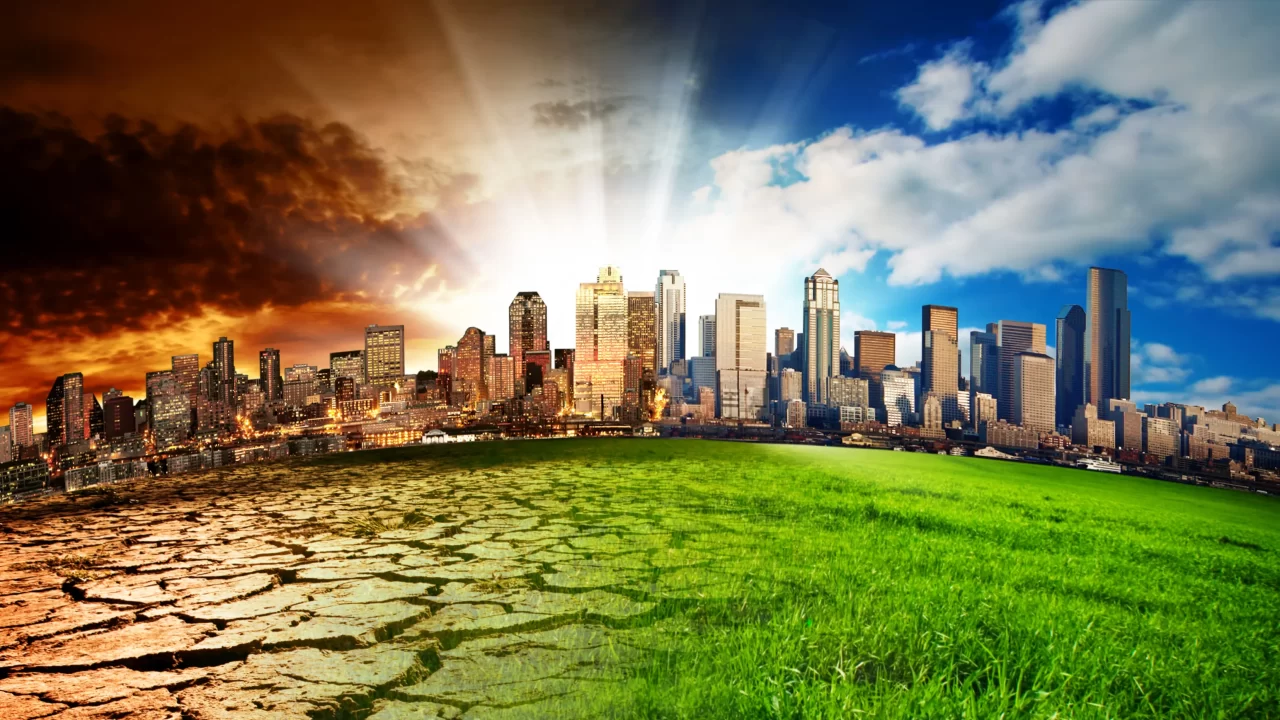 Ciudad dividida: mitad desértica con tonos rojos y mitad verde con vegetación, mostrando contraste climático futuro.